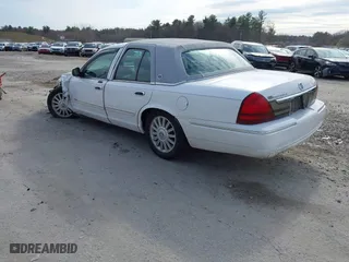 2010 Mercury Grand Marquis LS with VIN 2MEBM7FV7AX611959, listed as a IAAI auction lot 41980176 with 112,885 mi miles. Bid and sale history available at carsss.com. Image 3.