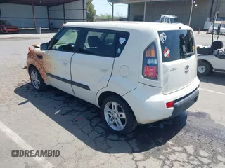 2010 Kia Soul + with VIN KNDJT2A28A7078333, listed as a IAAI auction lot 42097259 with 165,243 mi miles. Bid and sale history available at carsss.com. Image 3.