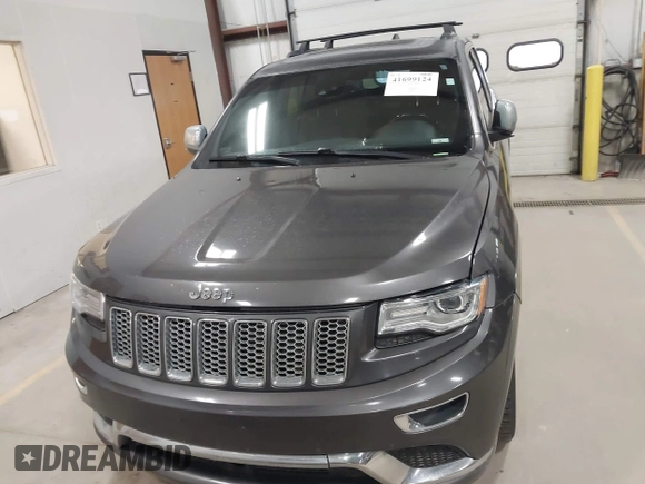 2015 Jeep Grand Cherokee Summit with VIN 1C4RJFJT6FC754799, listed as a IAAI auction lot 41699124 with 124,206 mi miles and . Bid and sale history available at DreamBid. Image 12.