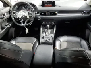 2018 Mazda CX-5 Touring z VIN JM3KFBCM2J0379190, wystawiony jako Copart lot #59233075 z przebiegiem 51 985 mil mil oraz Szkoda całkowita • Salvage title. Historia ofert i sprzedaży dostępna na DreamBid. Obrazek 8.