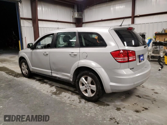 2013 Dodge Journey American Value z VIN 3C4PDCAB9DT536846, wystawiony jako Copart lot #86245174 z przebiegiem 162 677 mil mil oraz Szkoda całkowita • Salvage title. Historia ofert i sprzedaży dostępna na DreamBid. Obrazek 2.