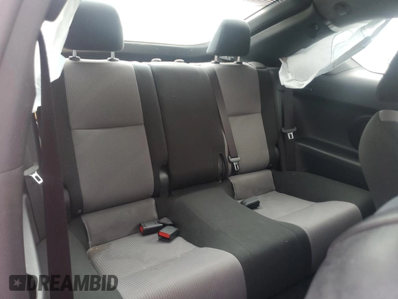 2014 Scion tC z VIN JTKJF5C79E3079305, wystawiony jako Copart lot #51750825 z przebiegiem 175 801 mil mil oraz Szkoda całkowita • Salvage title. Historia ofert i sprzedaży dostępna na DreamBid. Obrazek 10.