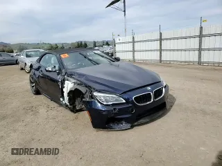 2016 BMW M6 z VIN WBS6G9C5XGD932039, wystawiony jako Copart lot #47433685 z przebiegiem 66 836 mil mil oraz Szkoda całkowita • Salvage title. Historia ofert i sprzedaży dostępna na DreamBid. Obrazek 13.