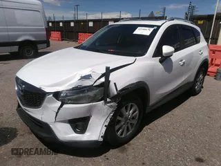 2014 Mazda CX-5 Touring with VIN JM3KE2CY7E0364311, listed as a IAAI auction lot 42108176 with 90,506 mi miles and . Bid and sale history available at DreamBid. Image 17.