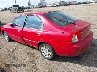 2002 Kia Spectra GS with VIN KNAFB161425076186, listed as a IAAI auction lot 42007615 with 90,269 mi miles. Bid and sale history available at carsss.com. Image 3.