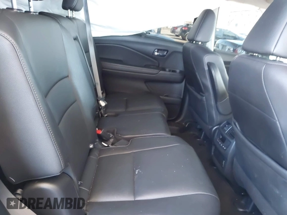 2022 Honda Pilot Special Edition with VIN 5FNYF5H29NB018557, listed as a IAAI auction lot 41402547 with 22,935 mi miles and . Bid and sale history available at carsss.com. Image 8.