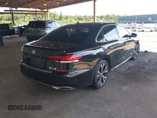 2021 Volkswagen Passat SE with VIN 1VWSA7A34MC008594, listed as a IAAI auction lot 40054898 with 78,664 mi miles and . Bid and sale history available at DreamBid. Image 4.