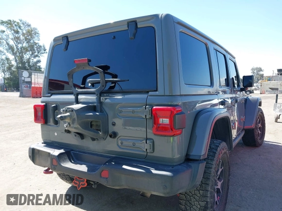 2019 Jeep Wrangler Unlimited Rubicon with VIN 1C4HJXFN6KW547401, listed as a IAAI auction lot 42250698 with 103,910 mi miles and . Bid and sale history available at DreamBid. Image 4.
