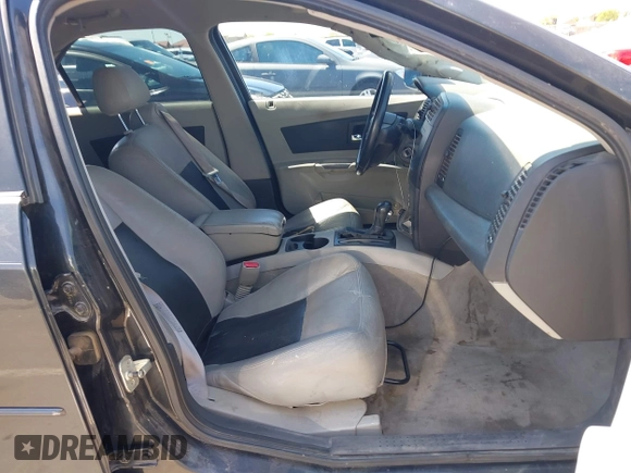 2005 Cadillac CTS with VIN 1G6DP567650227203, listed as a IAAI auction lot 42011203 with 151,683 mi miles. Bid and sale history available at carsss.com. Image 5.