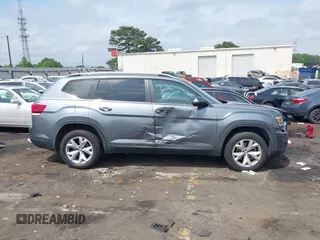 2019 Volkswagen Atlas SE with VIN 1V2DR2CA4KC524033, listed as a IAAI auction lot 42104613 with 97,362 mi miles and . Bid and sale history available at DreamBid. Image 13.