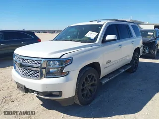 2018 Chevrolet Tahoe LT with VIN 1GNSCBKC8JR128476, listed as a IAAI auction lot 41447799 with 105,209 mi miles. Bid and sale history available at carsss.com. Image 18.