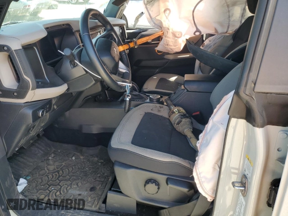 2022 Ford Bronco z VIN 1FMDE5BH4NLB47555, wystawiony jako Copart lot #55341415 z przebiegiem 16 134 mil mil oraz Szkoda całkowita • Salvage title. Historia ofert i sprzedaży dostępna na DreamBid. Obrazek 7.