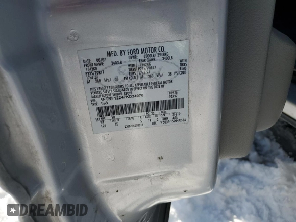 2007 Ford F-150 XL with VIN 1FTRF12247KD34976, listed as a Copart auction lot 41481905 with 115,139 mi miles and Salvage Title. Bid and sale history available at carsss.com. Image 12.