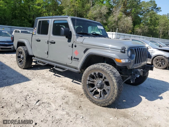 2021 Jeep Gladiator Willys with VIN 1C6HJTAG9ML542271, listed as a Copart auction lot 51947785 with 34,251 mi miles and Salvage Title. Bid and sale history available at carsss.com. Image 4.