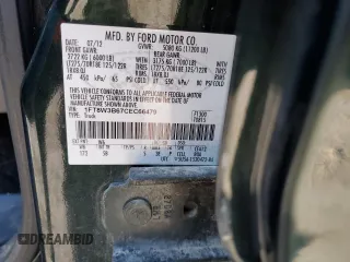 2012 Ford F-350 XL with VIN 1FT8W3B67CEC66479, listed as a Copart auction lot 74112284 with 64,711 mi miles and Salvage title. Bid and sale history available at DreamBid. Image 13.