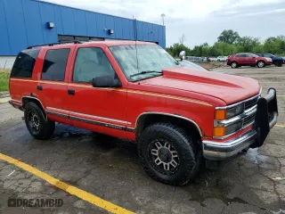 1999 Chevrolet Tahoe Z71 with VIN 1GNEK13R9XJ476615, listed as a Copart auction lot 61312114 with 174,729 mi miles and Clean Title. Bid and sale history available at carsss.com. Image 4.