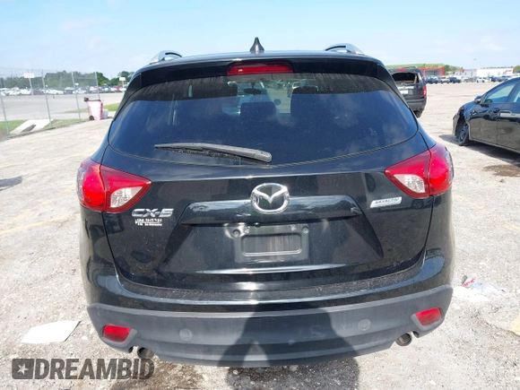 2014 Mazda CX-5 Touring with VIN JM3KE2CYXE0384987, listed as a IAAI auction lot 42052196 with 151,765 mi miles. Bid and sale history available at carsss.com. Image 16.