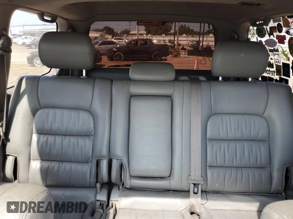 2006 Lexus LX 470 z VIN JTJHT00W264004516, wystawiony jako Copart lot #72607504 z przebiegiem 220 156 mil mil oraz Czysty tytuł • Clean title. Historia ofert i sprzedaży dostępna na DreamBid. Obrazek 10.