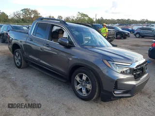 2024 Honda Ridgeline RTL with VIN 5FPYK3F51RB027232, listed as a IAAI auction lot 41199638 with 718 mi miles and . Bid and sale history available at DreamBid. Image 1.