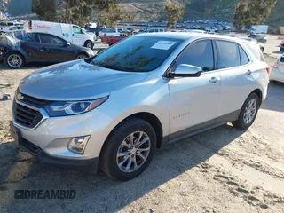 2020 Chevrolet Equinox LT with VIN 2GNAXUEV7L6111580, listed as a IAAI auction lot 41830060 with 96,968 mi miles and . Bid and sale history available at DreamBid. Image 18.