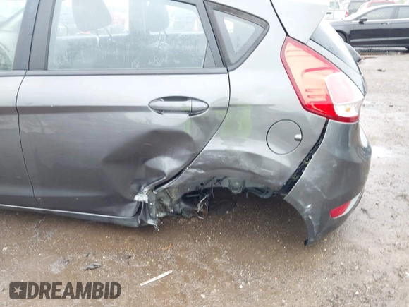 2018 Ford Fiesta SE with VIN 3FADP4EJ7JM130027, listed as a IAAI auction lot 42171799 with 65,253 mi miles and . Bid and sale history available at DreamBid. Image 6.