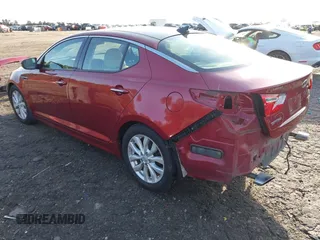 2015 Kia Optima EX with VIN 5XXGN4A75FG364506, listed as a IAAI auction lot 41701331 with 120,412 mi miles. Bid and sale history available at carsss.com. Image 3.
