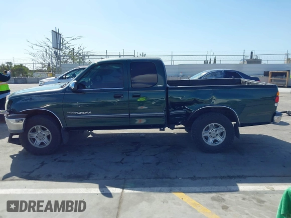 2000 Toyota Tundra SR5 with VIN 5TBRT3417YS122889, listed as a IAAI auction lot 41711107 with 288,475 mi miles and . Bid and sale history available at DreamBid. Image 14.