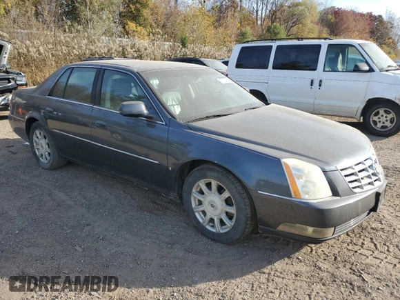 2009 Cadillac DTS 1SC z VIN 1G6KD57Y39U129722, wystawiony jako Copart lot #77071164 z przebiegiem 133 769 mil mil oraz Czysty tytuł • Clean title. Historia ofert i sprzedaży dostępna na DreamBid. Obrazek 4.