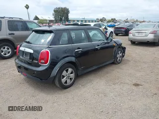 2015 MINI Hardtop 4 Door z VIN WMWXS5C58FT831568, wystawiony jako IAAI lot #42129819 z przebiegiem 76 044 mil mil oraz . Historia ofert i sprzedaży dostępna na DreamBid. Obrazek 4.