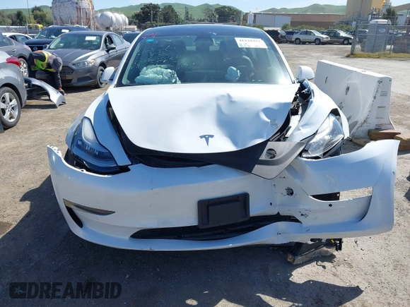 2020 Tesla Model 3 Long Range with VIN 5YJ3E1EB4LF619754, listed as a IAAI auction lot 41920422 with 82,430 mi miles and . Bid and sale history available at DreamBid. Image 6.