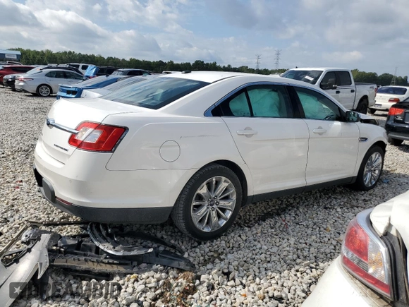 2012 Ford Taurus Limited with VIN 1FAHP2JW1CG141710, listed as a Copart auction lot 72746064 with 206,760 mi miles and Salvage title. Bid and sale history available at DreamBid. Image 3.