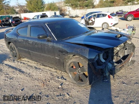 2006 Dodge Charger SRT-8 with VIN 2B3KA73W36H333944, listed as a IAAI auction lot 41339051 with 155,475 mi miles and . Bid and sale history available at carsss.com. Image 1.