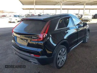 2023 Cadillac XT4 FWD Premium Luxury with VIN 1GYFZCR49PF173489, listed as a IAAI auction lot 41332451 with 10,227 mi miles and . Bid and sale history available at DreamBid. Image 4.