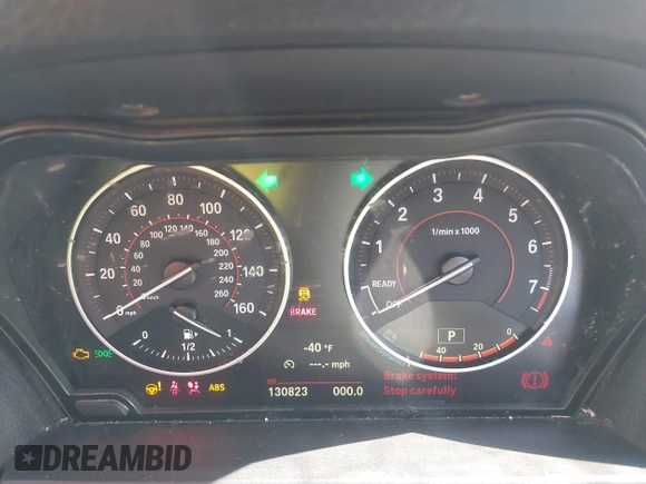 2015 BMW 2 Series 228i with VIN WBA1K5C57FV473826, listed as a IAAI auction lot 41866820 with 130,823 mi miles. Bid and sale history available at carsss.com. Image 7.