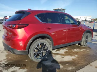 2022 Mazda CX-5 2.5 S Premium Plus Package with VIN JM3KFBEM0N1548636, listed as a Copart auction lot 77492254 with 22,220 mi miles and Non Repairable. Bid and sale history available at carsss.com. Image 3.