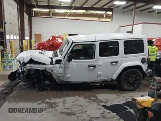 2021 Jeep Wrangler Unlimited Sahara with VIN 1C4JJXP60MW830307, listed as a IAAI auction lot 41869863 with 37,201 mi miles and . Bid and sale history available at DreamBid. Image 14.