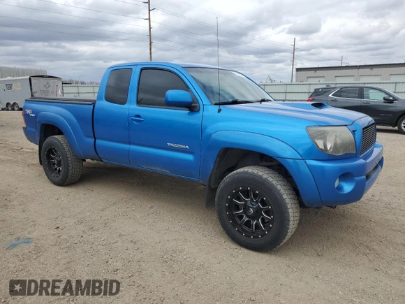 2005 Toyota Tacoma with VIN 5TEUU42N65Z073063, listed as a Copart auction lot 54052075 with 207,440 mi miles and Clean Title. Bid and sale history available at DreamBid. Image 4.