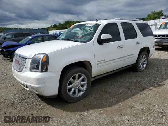 2014 GMC Yukon Denali with VIN 1GKS2EEF1ER212412, listed as a Copart auction lot 50954565 with 115,964 mi miles and Salvage Title. Bid and sale history available at carsss.com. Image 1.