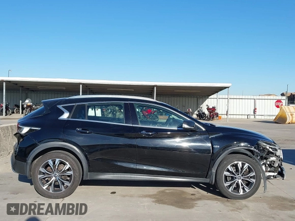2018 Infiniti QX30 Luxury with VIN SJKCH5CRXJA058994, listed as a IAAI auction lot 41389481 with 69,907 mi miles and . Bid and sale history available at DreamBid. Image 6.