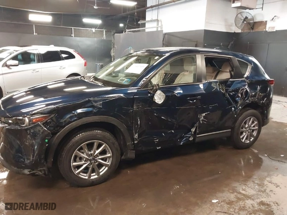 2023 Mazda CX-5 2.5 S Carbon Edition with VIN JM3KFBCM3P0265952, listed as a IAAI auction lot 41541769 with 12,886 mi miles. Bid and sale history available at carsss.com. Image 14.