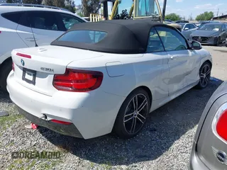 2020 BMW 2 Series 230i with VIN WBA2M7C02L7E85044, listed as a IAAI auction lot 41625210 with 27,232 mi miles. Bid and sale history available at carsss.com. Image 4.