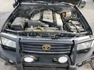 1999 Toyota Land Cruiser with VIN JT3HT05J4X0060695, listed as a Copart auction lot 75541434 with 282,651 mi miles and Salvage Title. Bid and sale history available at carsss.com. Image 12.