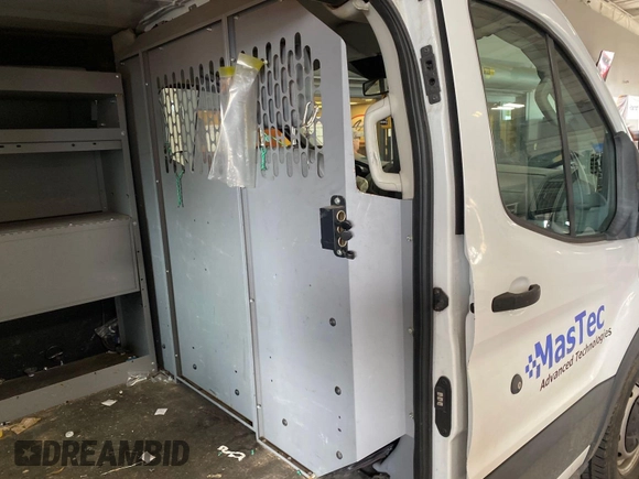 2016 Ford Transit Cargo with VIN 1FTYE1YM4GKB52041, listed as a IAAI auction lot 42284153 with 177,079 mi miles and . Bid and sale history available at DreamBid. Image 3.