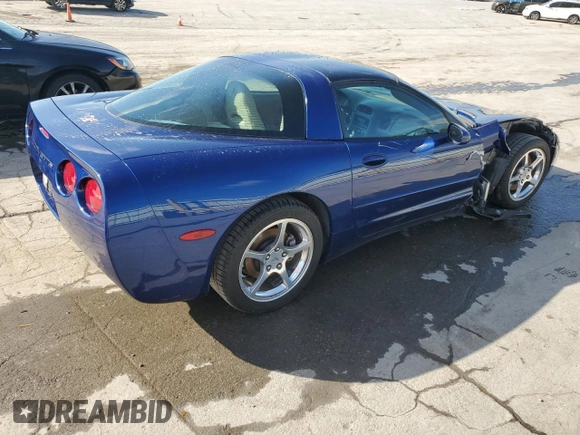 2004 Chevrolet Corvette with VIN 1G1YY22G145132963, listed as a Copart auction lot 74264184 with 74,077 mi miles and Salvage Title. Bid and sale history available at carsss.com. Image 3.