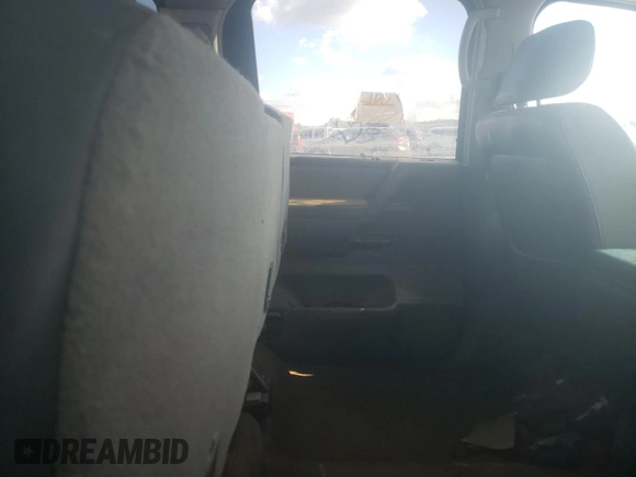 2005 Nissan Titan SE with VIN 1N6BA07B45N557451, listed as a Copart auction lot 80077824 with Not Provided miles and Salvage Title. Bid and sale history available at DreamBid. Image 10.