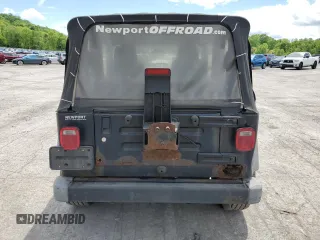 2004 Jeep Wrangler SE with VIN 1J4FA29124P796031, listed as a Copart auction lot 56875525 with 239,488 mi miles and Clean title. Bid and sale history available at DreamBid. Image 6.