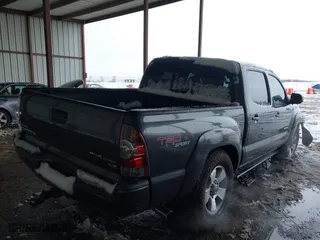 2013 Toyota Tacoma PreRunner with VIN 3TMJU4GN6DM153390, listed as a IAAI auction lot 41300619 with 163,974 mi miles. Bid and sale history available at carsss.com. Image 4.