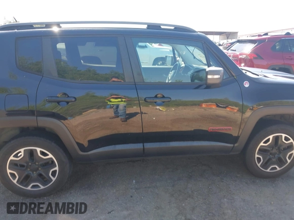 2015 Jeep Renegade Trailhawk with VIN ZACCJBCT1FPC17815, listed as a IAAI auction lot 42043290 with 247,652 mi miles and . Bid and sale history available at DreamBid. Image 13.