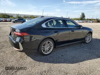 2024 BMW 5 Series 530i with VIN WBA43FJ01RCR71818, listed as a Copart auction lot 87510515 with 19,776 mi miles and Clean Title. Bid and sale history available at carsss.com. Image 3.
