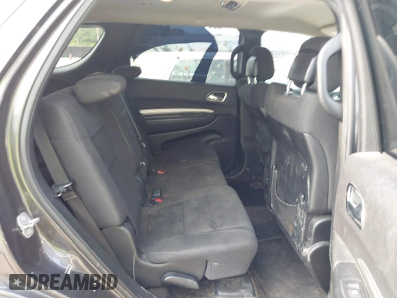 2015 Dodge Durango SXT with VIN 1C4RDJAG8FC939000, listed as a IAAI auction lot 42459660 with 108,101 mi miles and . Bid and sale history available at DreamBid. Image 8.